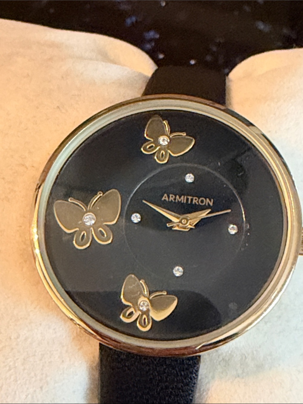 Armitron Black Dial Watch with Gold Butterfly Accents